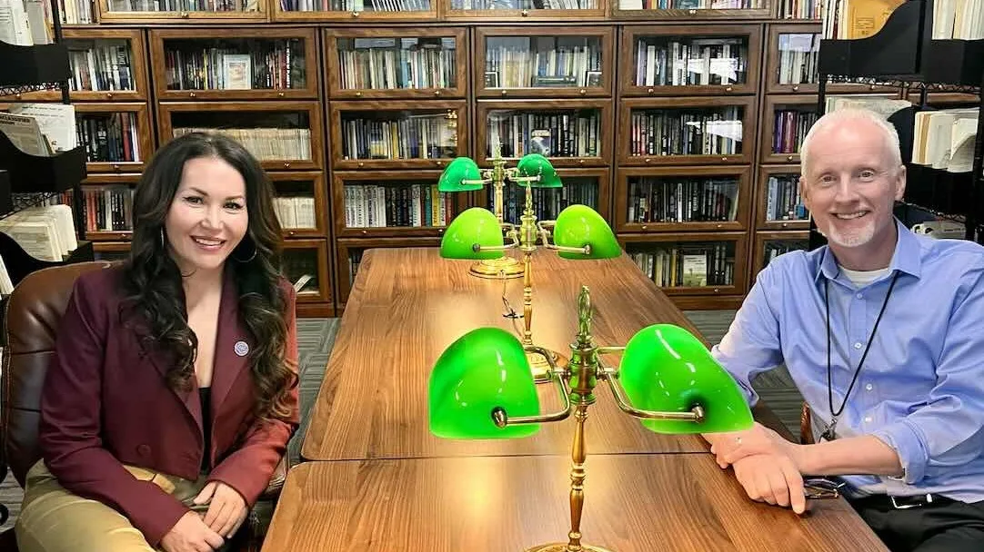 David Marler and a colleague at a reading table inside the NUFOHRC UFO archive in Rio Rancho, New Mexico