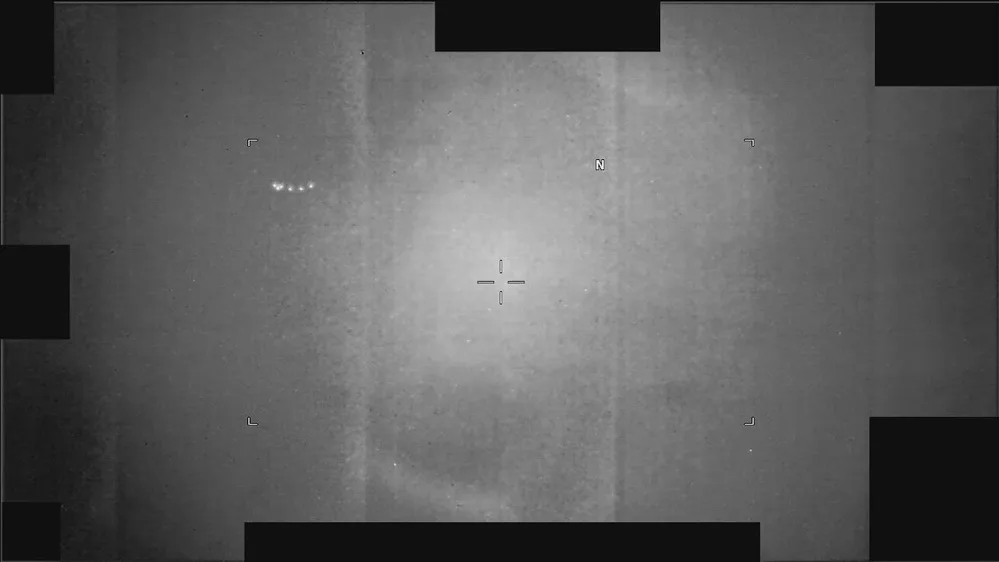 Official infrared still of clustered spherical UAP over the Middle East, 2025 – DOW-UAP-PR135