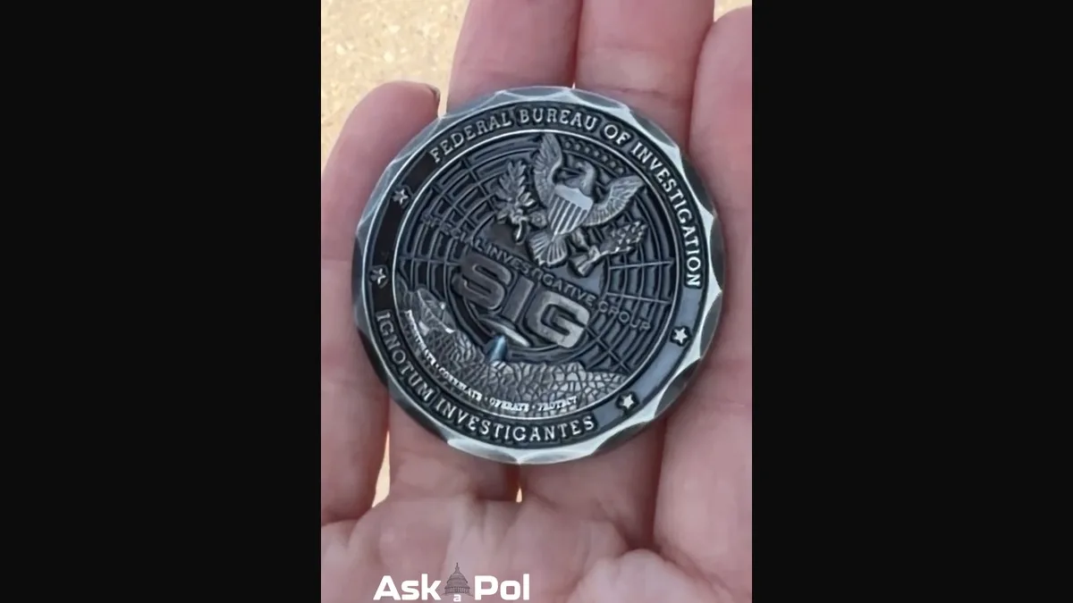 Front of the FBI SIG UAP challenge coin