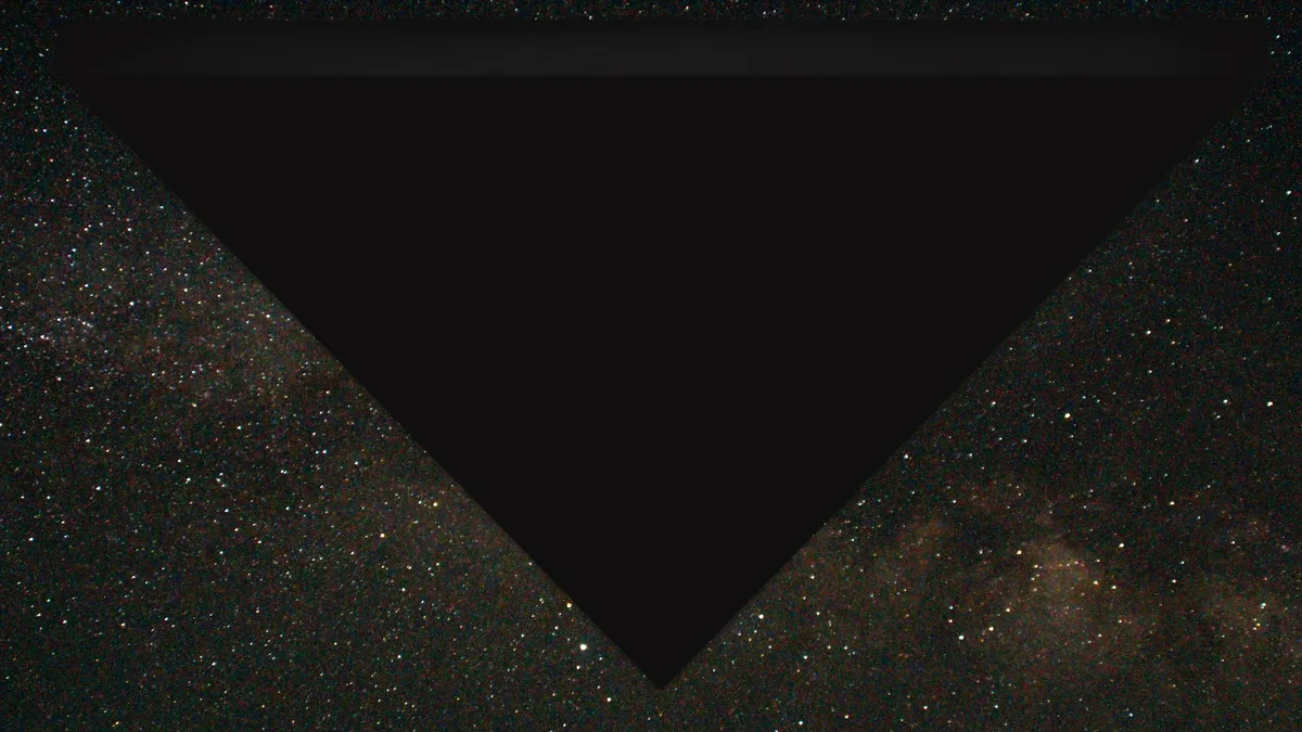 Official FBI digital rendering of a large dark equilateral triangle against a starry night sky – Airborne Triangle, 2002