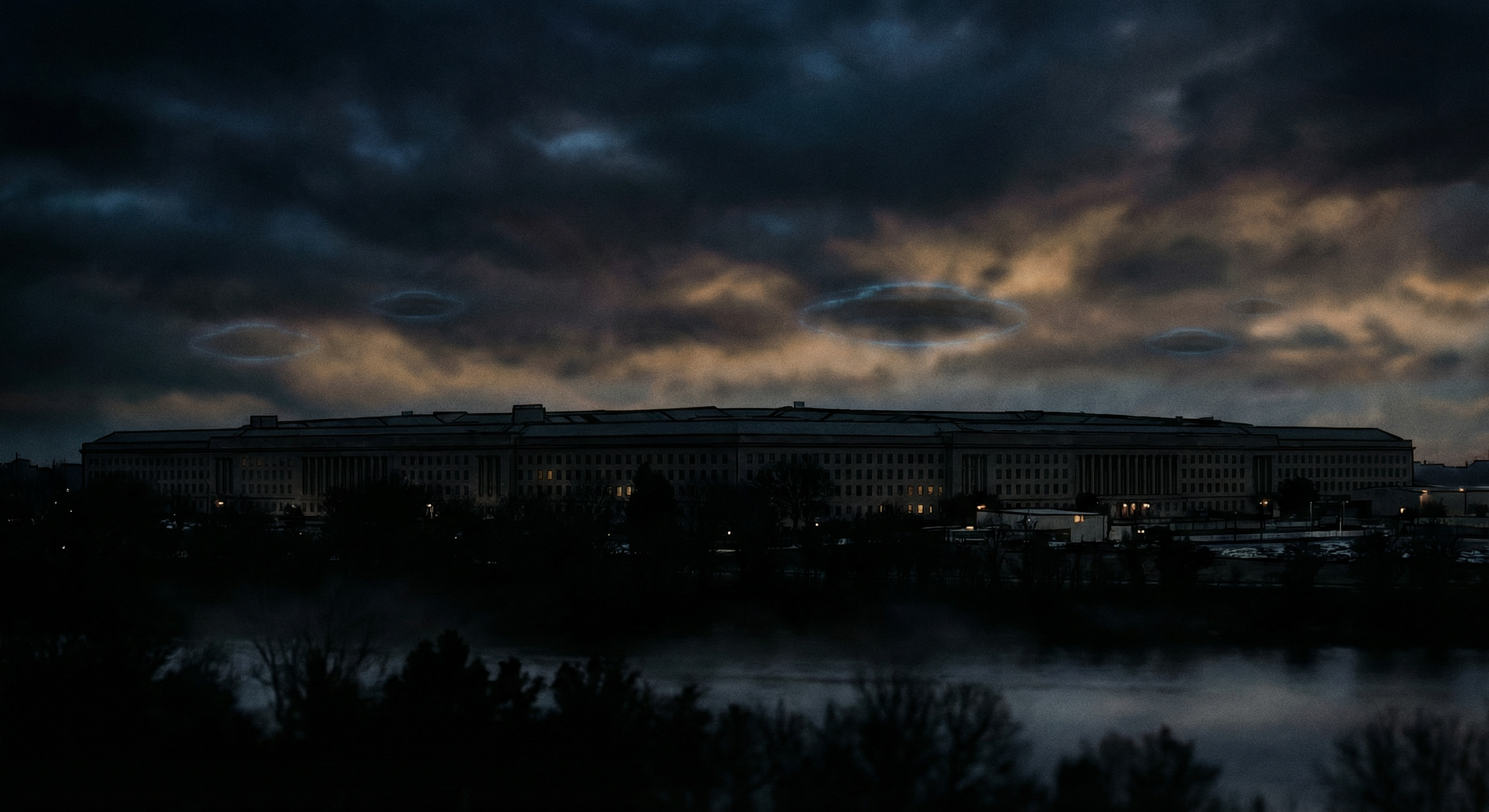 Faint disc-shaped objects hover in a twilight sky above the Pentagon building at dusk